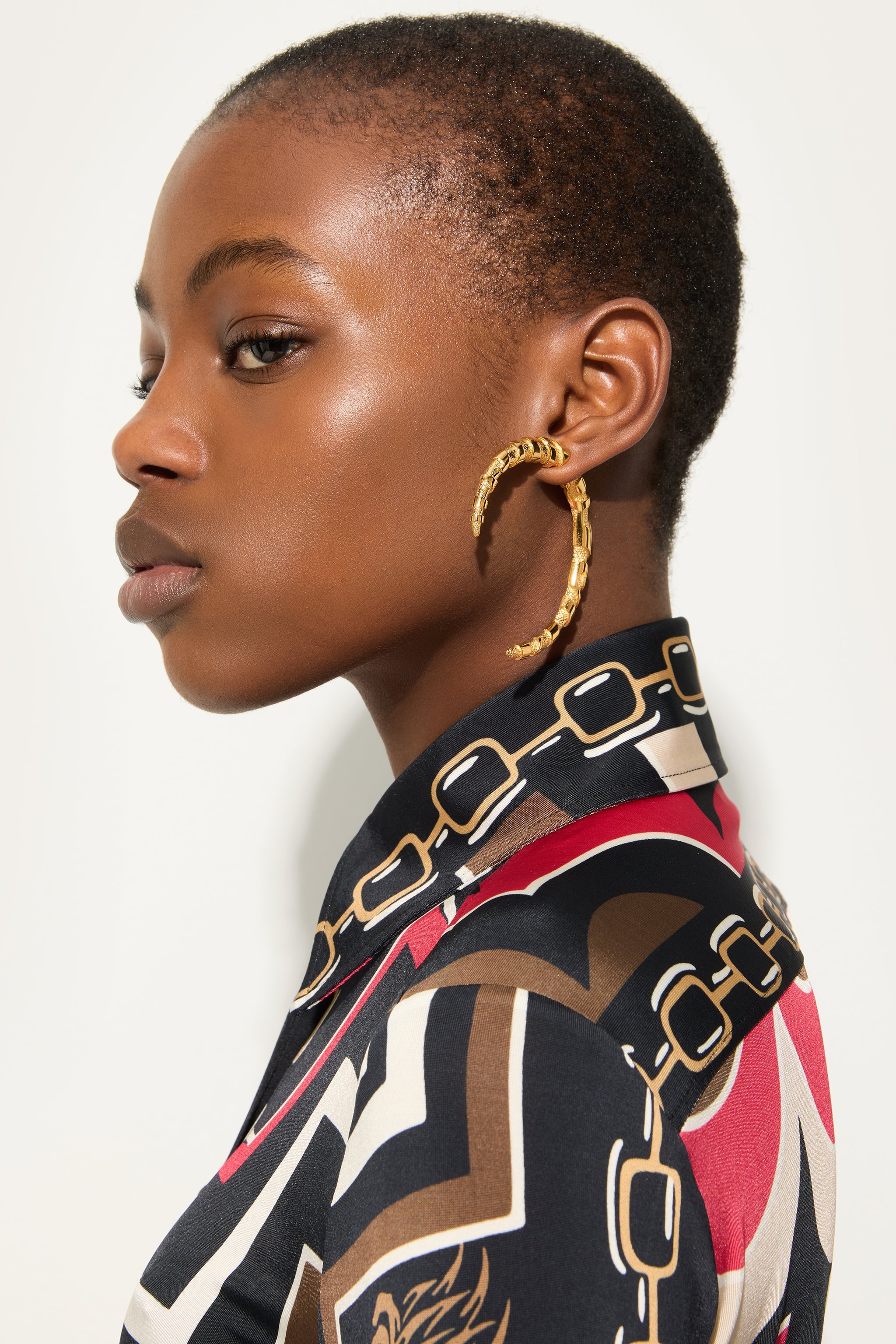 Emilio Pucci Corno Boucle Oreille gold effet marbre