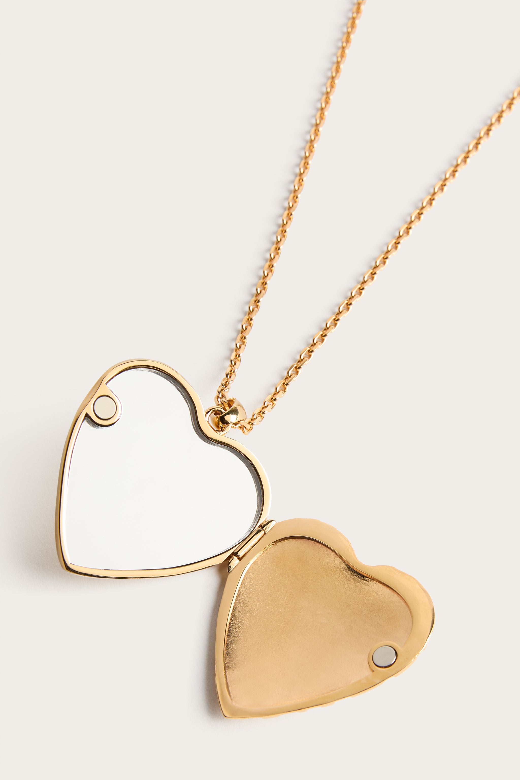 Emilio Pucci collier cœur miroir or