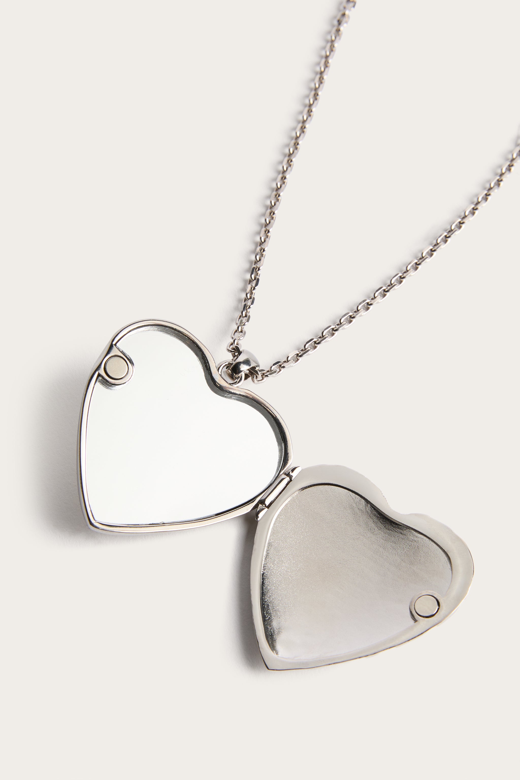Emilio Pucci Collier coeur miroir palladium